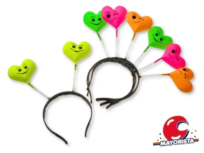 [371876055028] VINCHA RESORTE PLASTICA CORAZON CARITA (5502) TRIGGER PACK